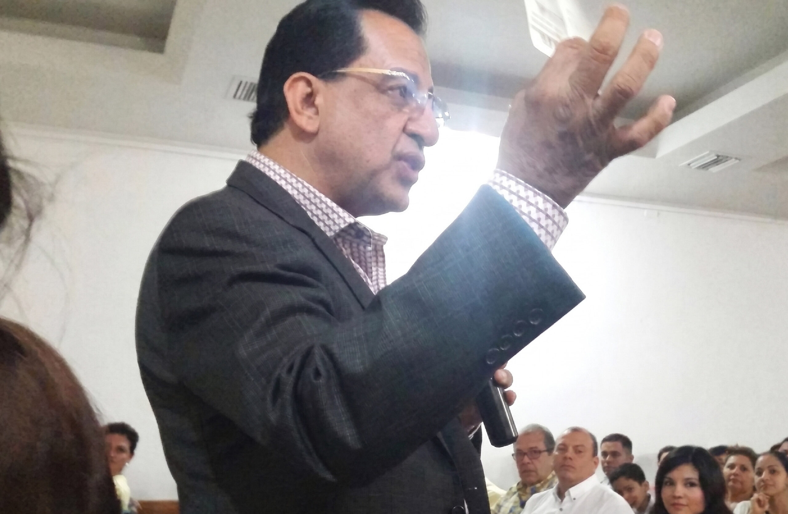 Dr. John Sachtouras speaking at an international business conference